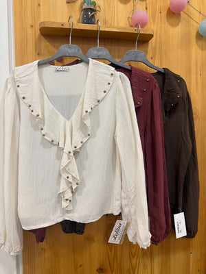 Blusa tachas