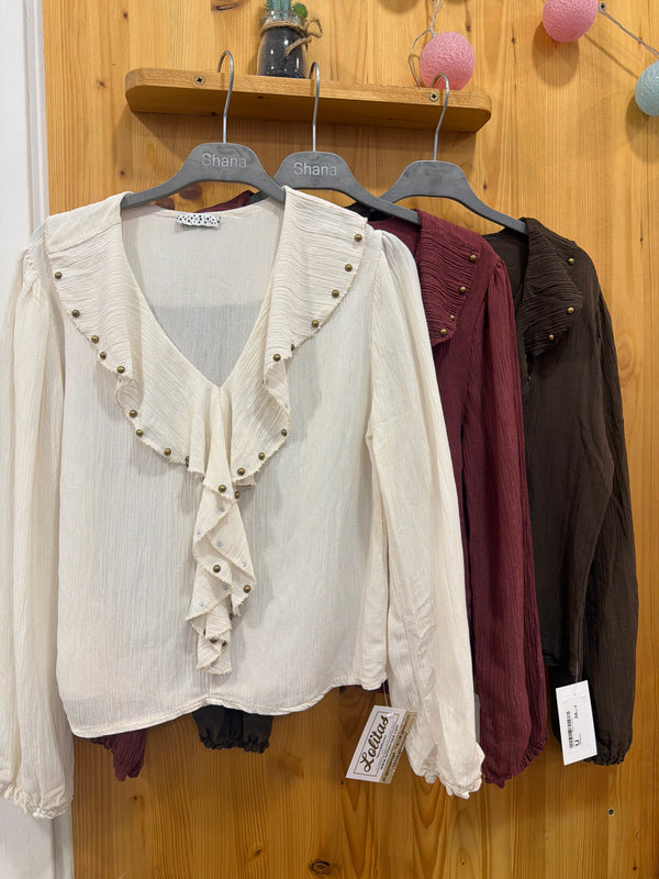 Blusa tachas