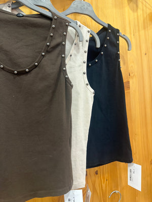Top titante tachas