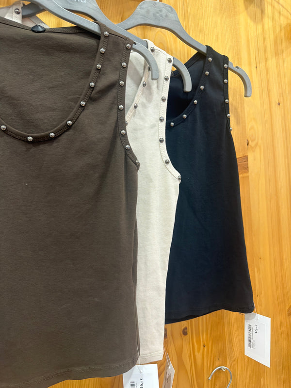 Top titante tachas