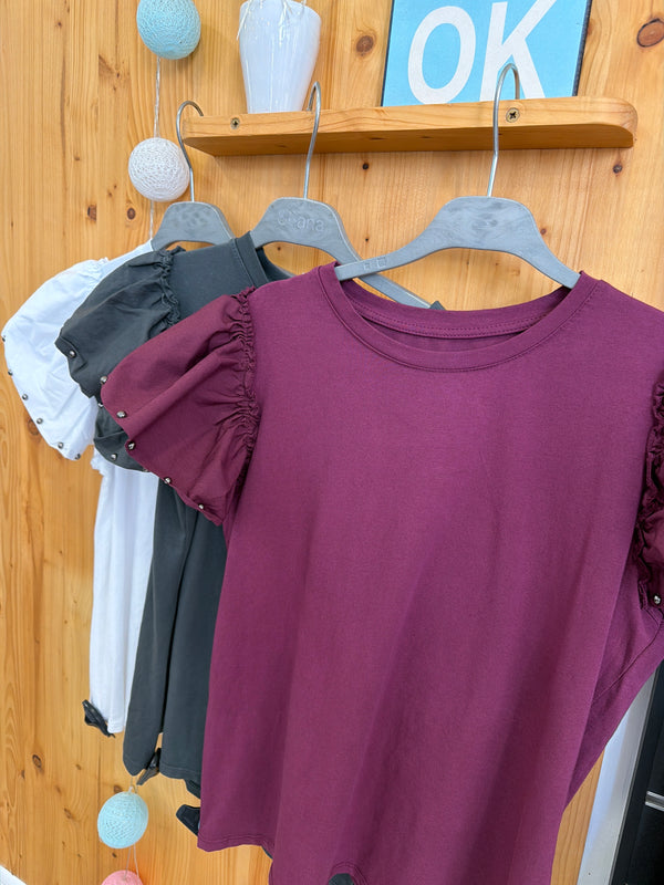 Camiseta tachas volante