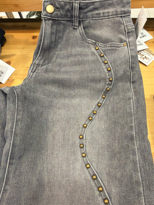 Jeans tachas curva