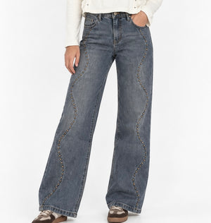 Jeans tachas curva